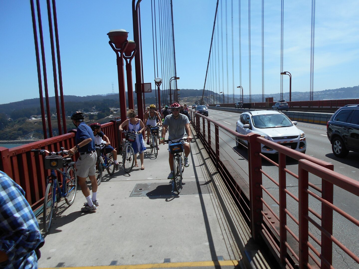 Dedicated cycling path across Golden Gate Bridge with bay views